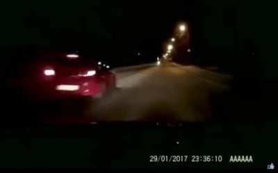Russia: Red car makes lada skid into author