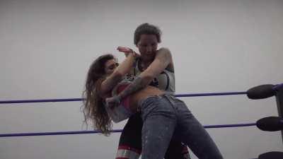 Even after all her humiliating losses, Amber still leaves her six pack as easy target