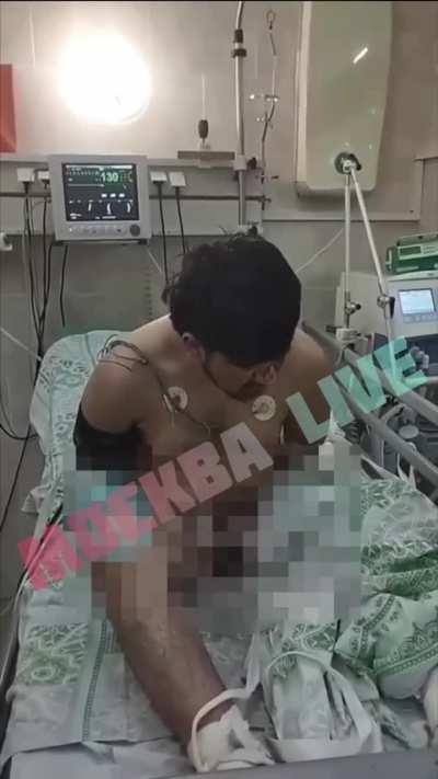 One of the terrorists getting interrogated at the hospital