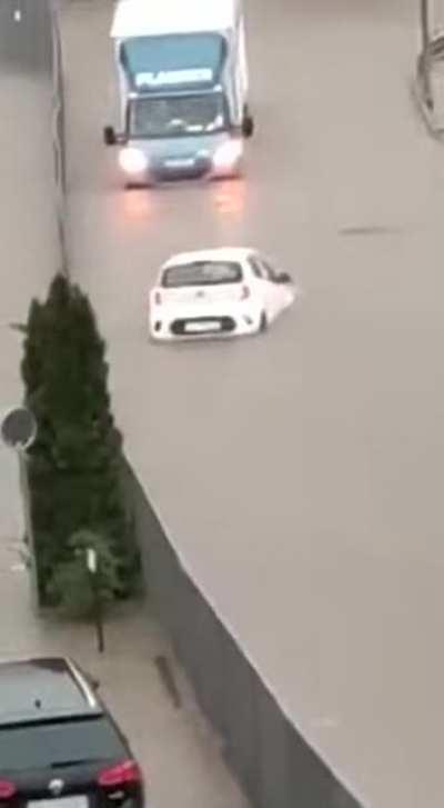 Driver turns their car into a boat, then back into a car