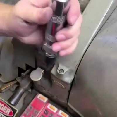Impact screwdriver to remove stubborn screws
