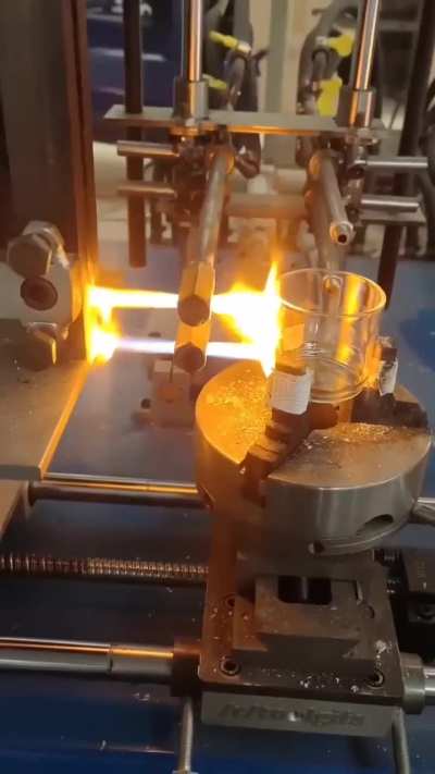 Hot-joining a handle to a glass cup