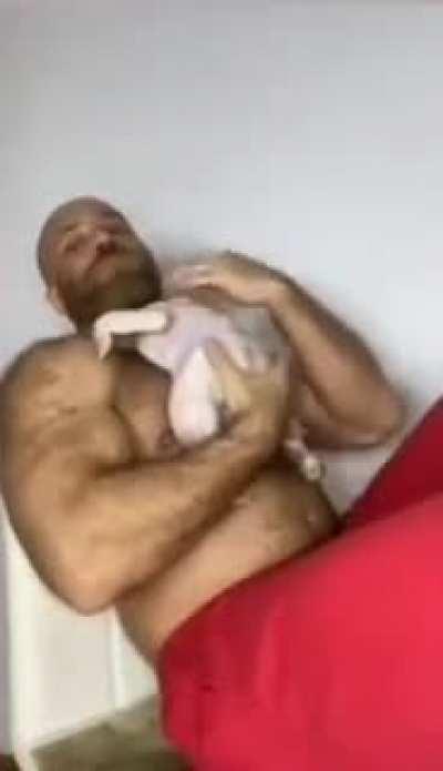 Joshua Tomar lovingly moisturizes chicken