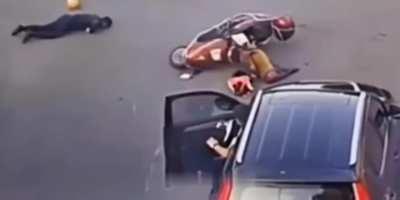 Driver opens door without checking for traffic. Crashes two motorcycles.