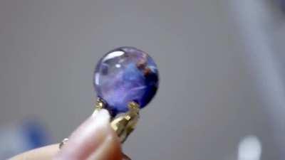 I work with resin and made this nebula orb.