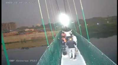 Bridge collapse in India kills 132. Two remain missing.