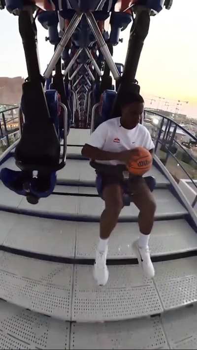 Lethal Shooter sinks a basketball shot while riding a rollercoaster in Saudi Arabia