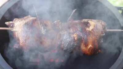 2 whole chickens on the Joetisserie using 2 apple wood chunks.