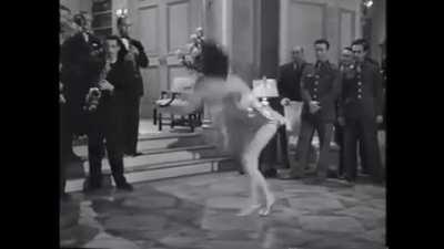 Miriam LaVelle flipping in heels, 1944