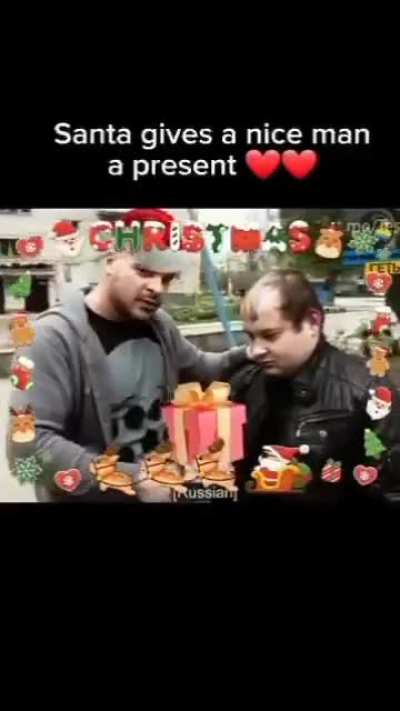 Santa gives a nice man a present
