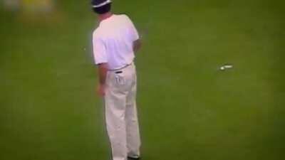 Throwing your golf club while the ball is still rolling