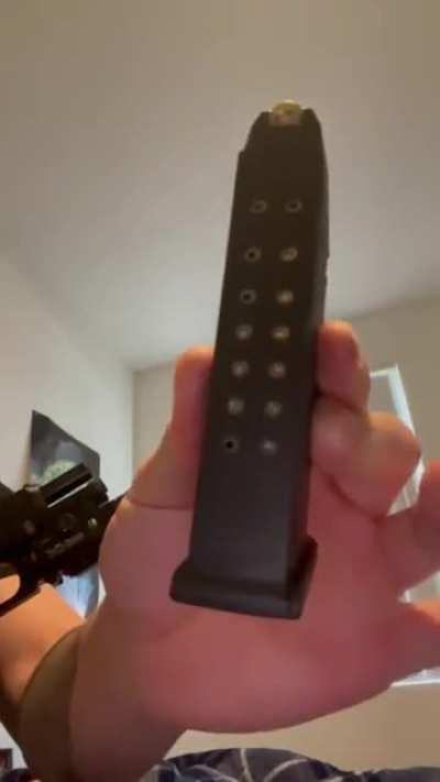 Slide release issue! I know I’m kind of slamming in the mag but during a fast reload drill, you don’t have time to gently put the mag in... does anyone know how I can fix this? It never feeds the second round correctly if it loads like this.