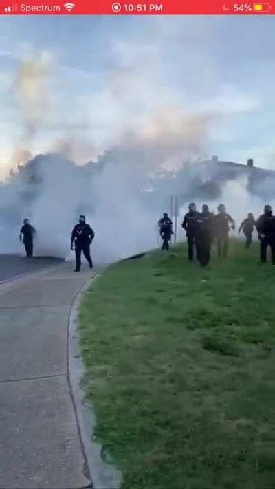 Richmond Police Dept. fire teargas at peaceful protestors. The event was set to end at the 8pm curfew time, the gas was dispensed at 7:35pm.