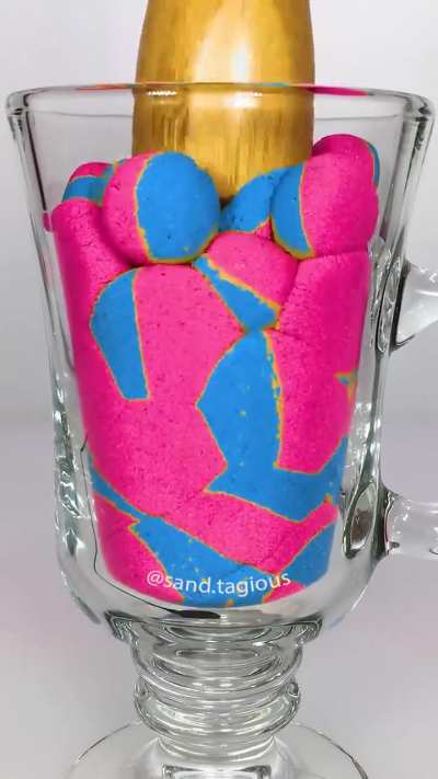 Very satisfying ball drop and squish sandtagious.