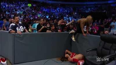 Nikki Bella getting trampled and kicked in the belly