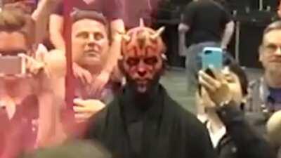 Darth Maul stands and angrily watches Darth Maul out-Darth Maul him