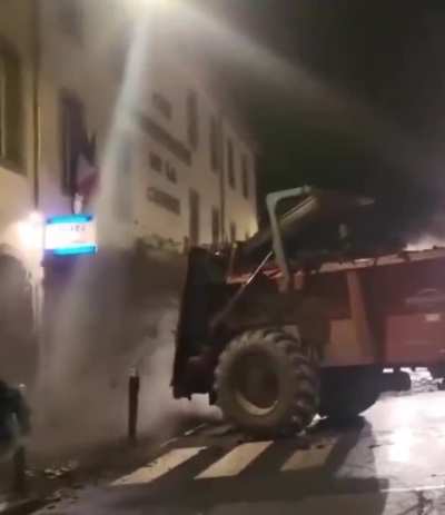 Supposedly at a police station. Pissed off farmer and his cow sh*t