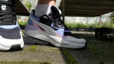 Snail crushed under sneakers while shopping