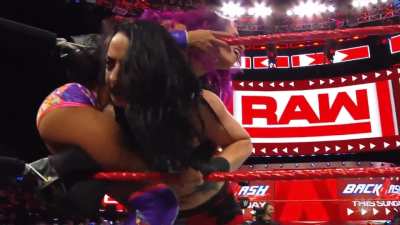 Ruby Riott punishing Sasha Banks