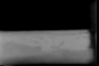 Jap soldier filmed crawling for cover from inside a Sherman flamethrower tank during the Battle of Iwo Jima. The tank fires its coaxial machine gun then douses the ditch in napalm.