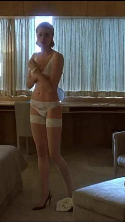 Rebecca Romijn's tight body in Femme Fatale