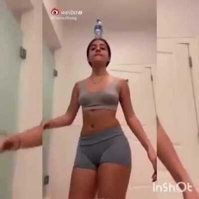 Belly dancing and balancing