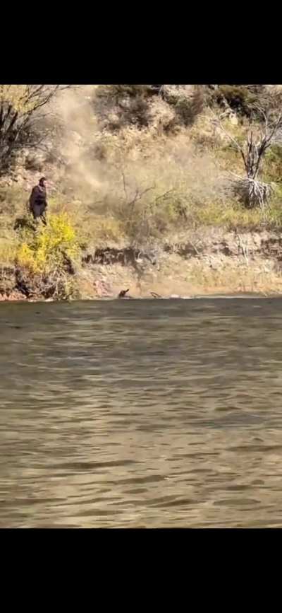 Ancient tractor going downhill into the water