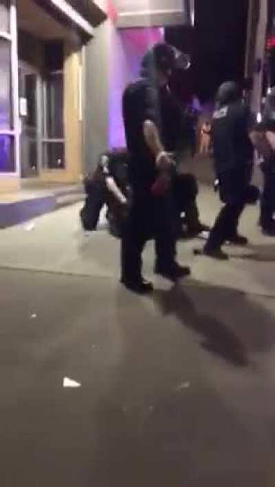 Seattle Police brutally beating restrained protestors