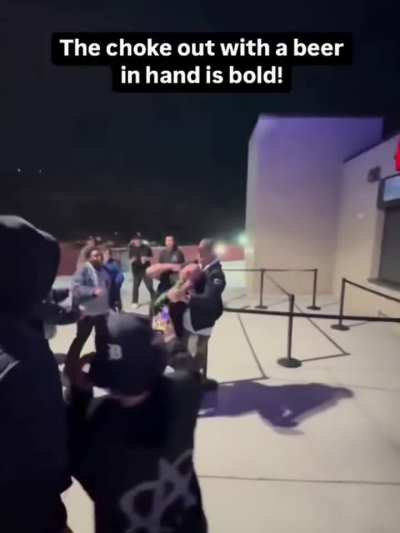 Drunk man gets unexpectedly choked out at sporting event.