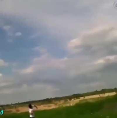 guy wraps rock in copper wire and throws it at power line