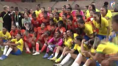 Indian National female football team calling Brazil female team for a group picture after match