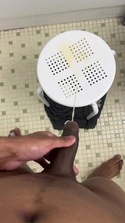 Peeing all over a stool