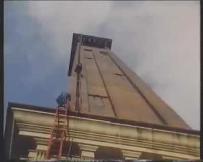 Steeplejack climbs chimney overhang at 300'