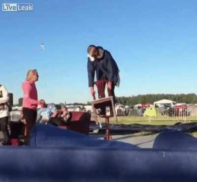 Hitting the table you're standing on with a chair