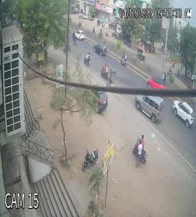 Man lay injured on the street as people pass by without any help.