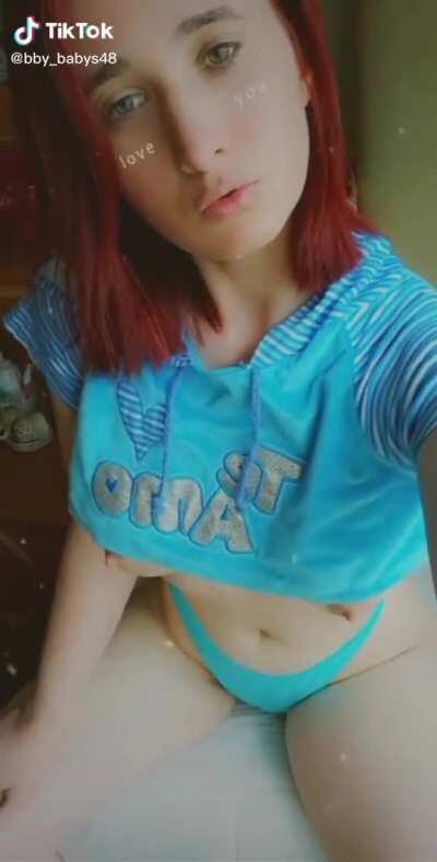 Tik Thot showing her nipples