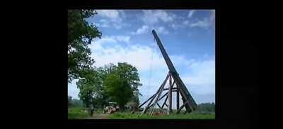 Jeremy Clarkson launching a Nissan Sunny with a trebuchet