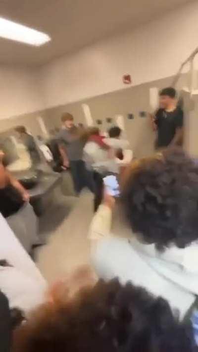 Fight at my school guy in red said the other guy wouldn't do shit