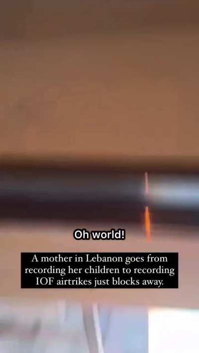 A mother in Lebanon recording her child moments before Israel airstrikes a neighboring block.