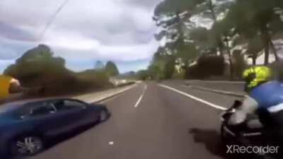 Girlfriend pulls emergency brake to stop her boyfriend from racing the biker.