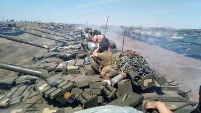 ua pov. A lot of Ukrainian armored vehicles at a gathering, especially tanks. All have the recent post-Kharkiv camo