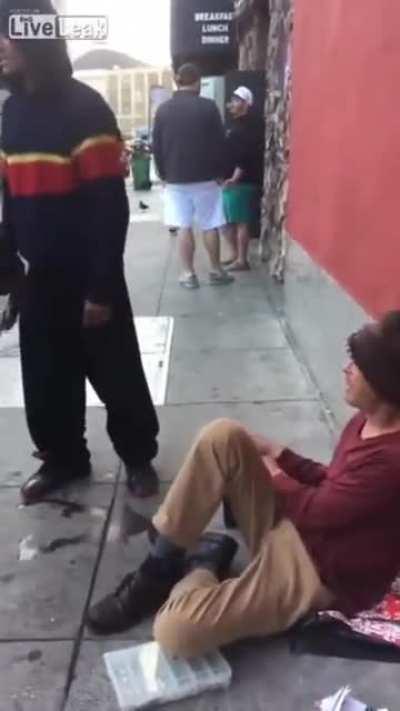 Cracked out loser shoves a wad of human feces into a homeless person's face
