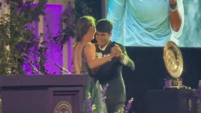 Carlos Alcaraz and Barbora Krejcikova dancing.