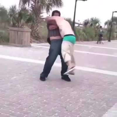 Insane Parler racist spits on black guy. Black guy takes him out in seconds. Cherry on top: He loses his pants.