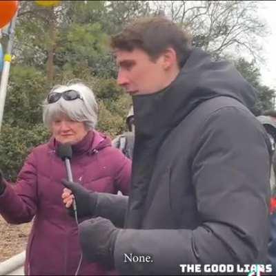 Protesting with a “choose adoption” sign