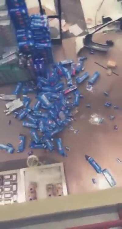 Car crashes through grocery store