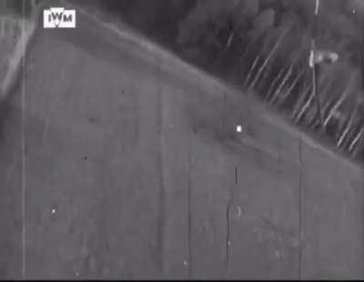 RAF Squadron Leader Evan Mackie, of No. 80 Squadron, in a Hawker Tempest shoots down an Arado Ar 96 trainer plane near Fassberg, Germany in April 1942