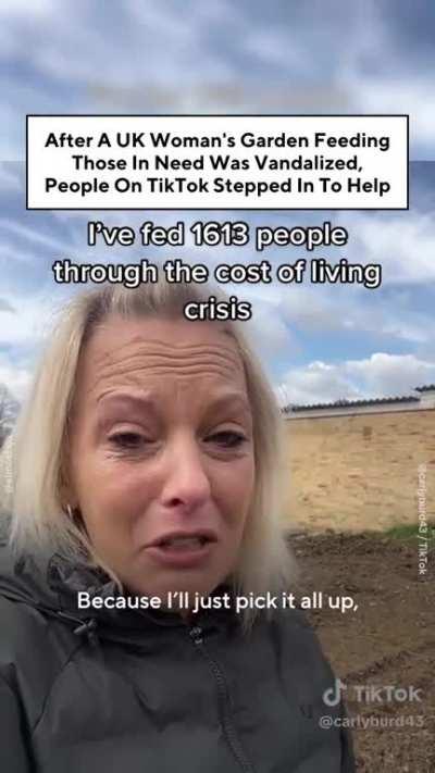 People helped to rebuild owner's garden that were destroyed by vandals