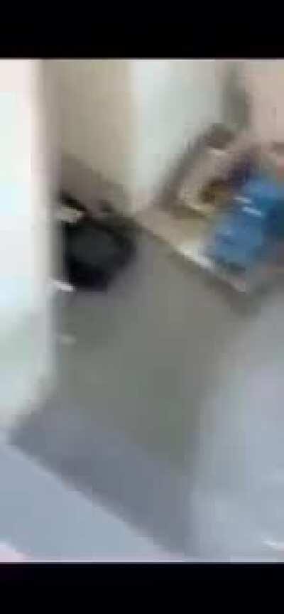 Possibly police confiscating or planting bricks. If latter is true it may support images emerging from multiple cities of pallets of bricks showing near protestors. Boston, MA.