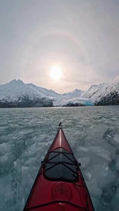 Boating on nearly frozen lake